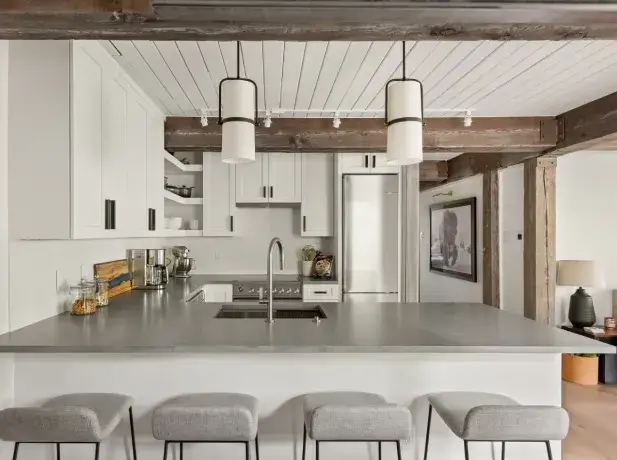 New-Projectasdf Modern sage green kitchen with marble backsplash, wood island, and snowy mountain view